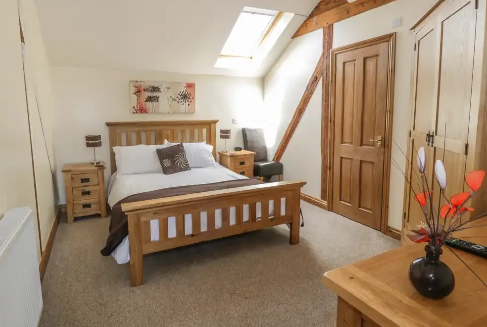 Bedroom at The Mill Farm Cottage near Shrewsbury