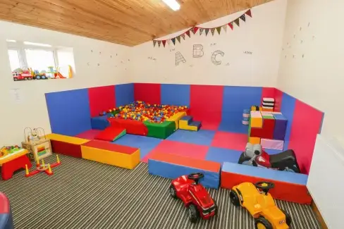 Children’s play area at The Mill Farm Cottage near Shrewsbury, Shropshire