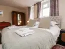 Bedroom at The Old Guard House - thumbnail photo