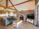 Open plan living area at The Owl Barn - thumbnail photo