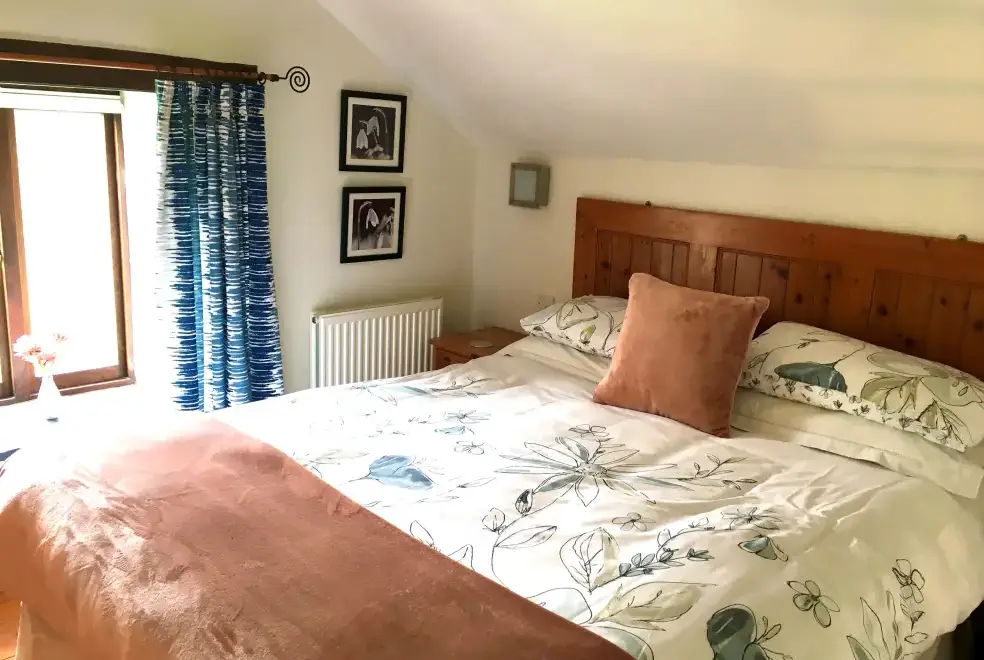 Bedroom at The Owlery, romantic couples' cottage