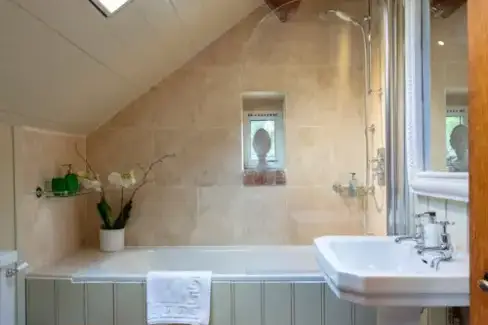 Family bathroom at The Shooting lodge, Wrackleford Estate, Dorset