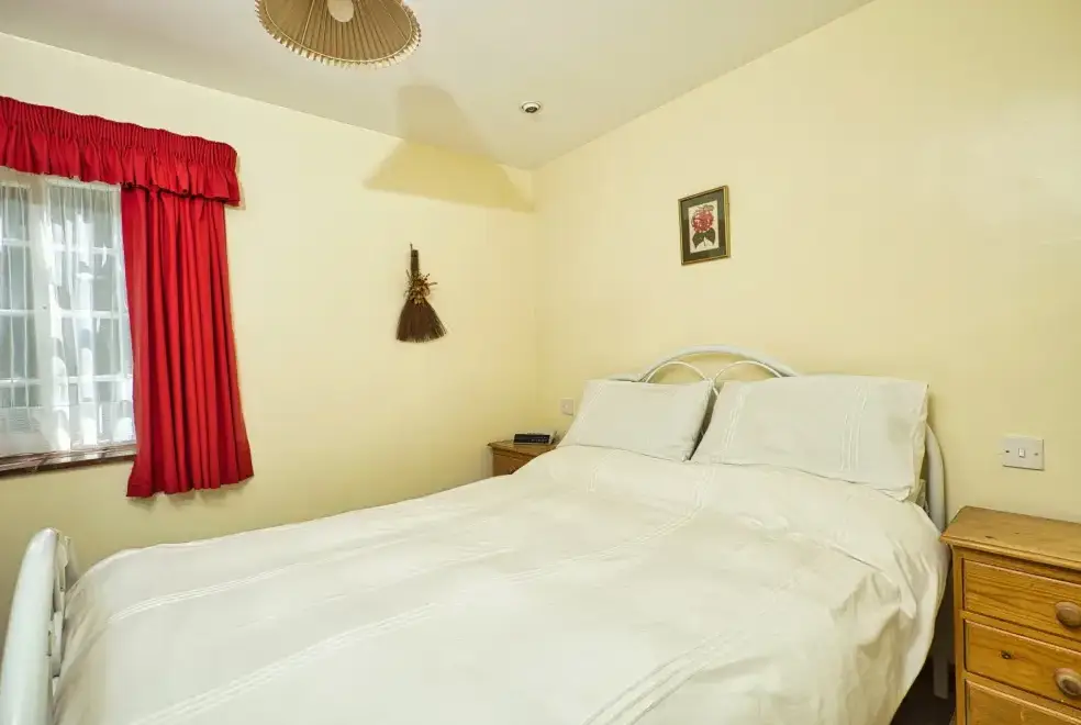 Bedroom at The Stable, Old Barn Cottages