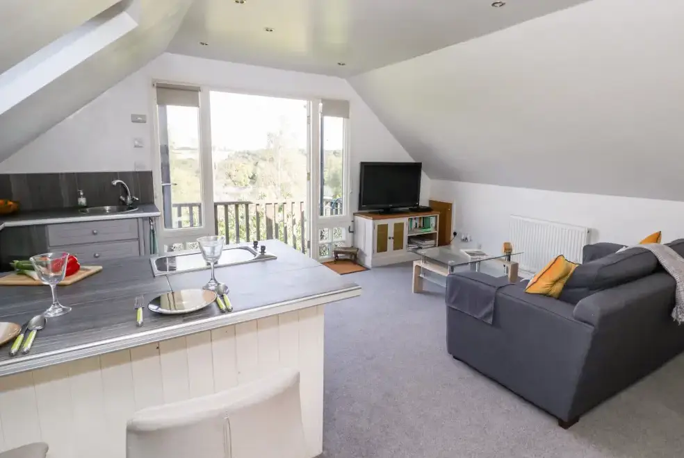 Open plan living area at The Stilehouse Apartment