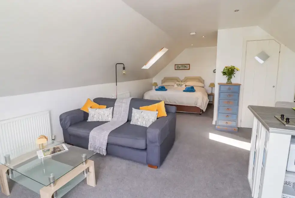 Open plan living area at The Stilehouse Apartment