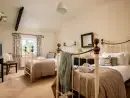 Bedroom at Tincleton Lodge - thumbnail photo
