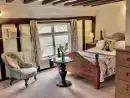 Bedroom at Toad Hall, Swilland - thumbnail photo