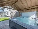 Outdoor hot tub at Trebrowen - thumbnail photo