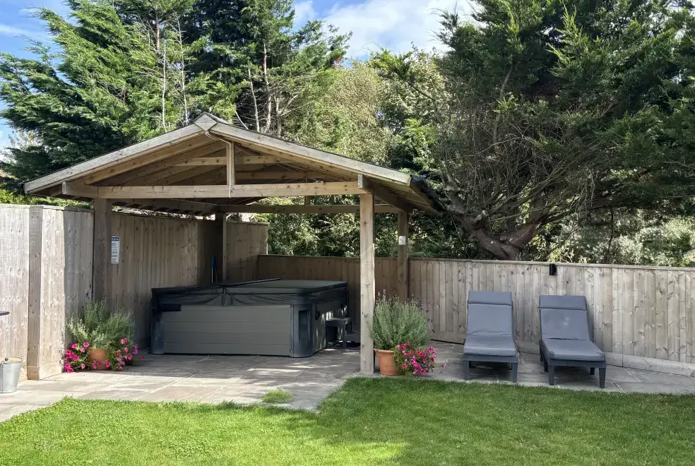 Outdoor hot tub at Trebrowen