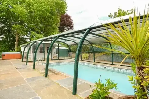 Shared Swimming Pool at Treetops Rural Retreat, Monmouthshire