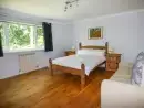 Bedroom at Treetops Rural Retreat - thumbnail photo