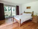 Bedroom at Treetops Rural Retreat - thumbnail photo