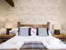 Romantic double bedroom at Trinity Cottage at Oxford Country Cottages - thumbnail photo
