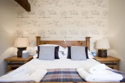 Romantic double bedroom at Trinity Cottage at Oxford Country Cottages, Oxfordshire