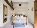 Romantic double bedroom at Trinity Cottage at Oxford Country Cottages - thumbnail photo