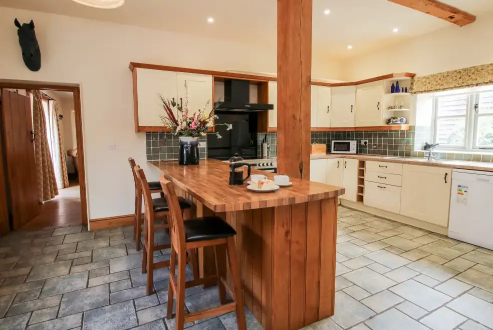 Kitchen/diner at Trooper's Holiday Barn, Shropshire Hills AONB