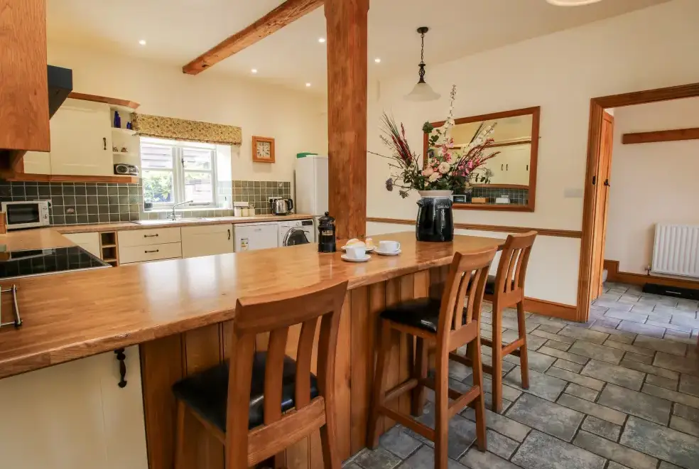 Kitchen/diner at Trooper's Holiday Barn, Shropshire Hills AONB