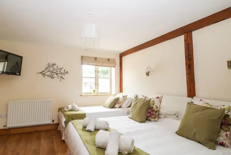 Bedroom at Trooper's Holiday Barn, Shropshire Hills AONB