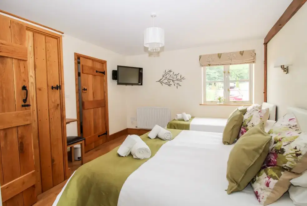 Bedroom at Trooper's Holiday Barn, Shropshire Hills AONB