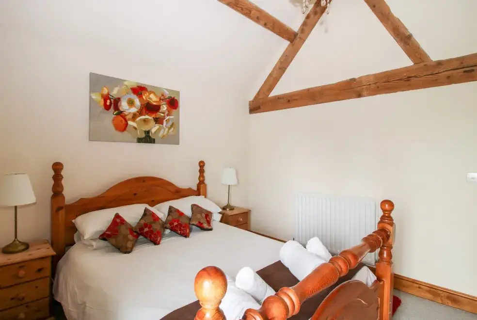 Bedroom at Trooper's Holiday Barn, Shropshire Hills AONB