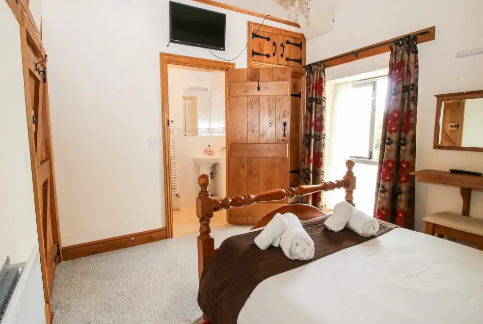 Bedroom at Trooper's Holiday Barn, Shropshire Hills AONB