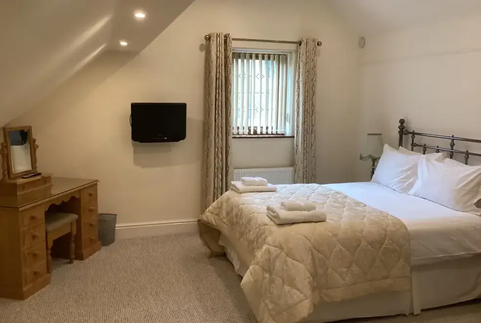 Bedroom at Two Owls Lodge