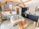 Open plan living area at Ty Coch - thumbnail photo