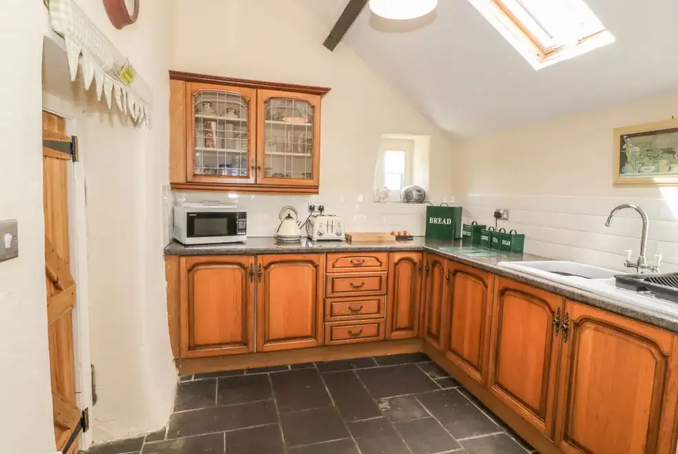 Farmhouse style kitchen at Ty Fferm Bodlasan