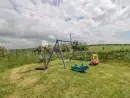 Children’s play area at Ty Fferm Bodlasan - thumbnail photo