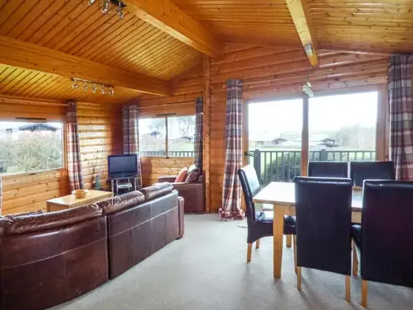 Lounge at Ty Pren Pet-Friendly Log Cabin, South Wales 