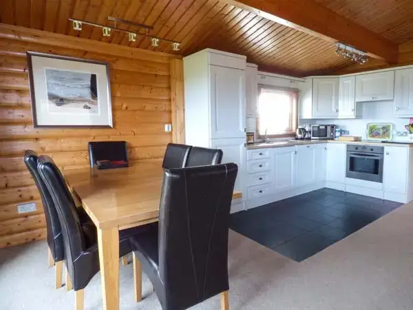 Kitchen/diner at Ty Pren Pet-Friendly Log Cabin, South Wales 