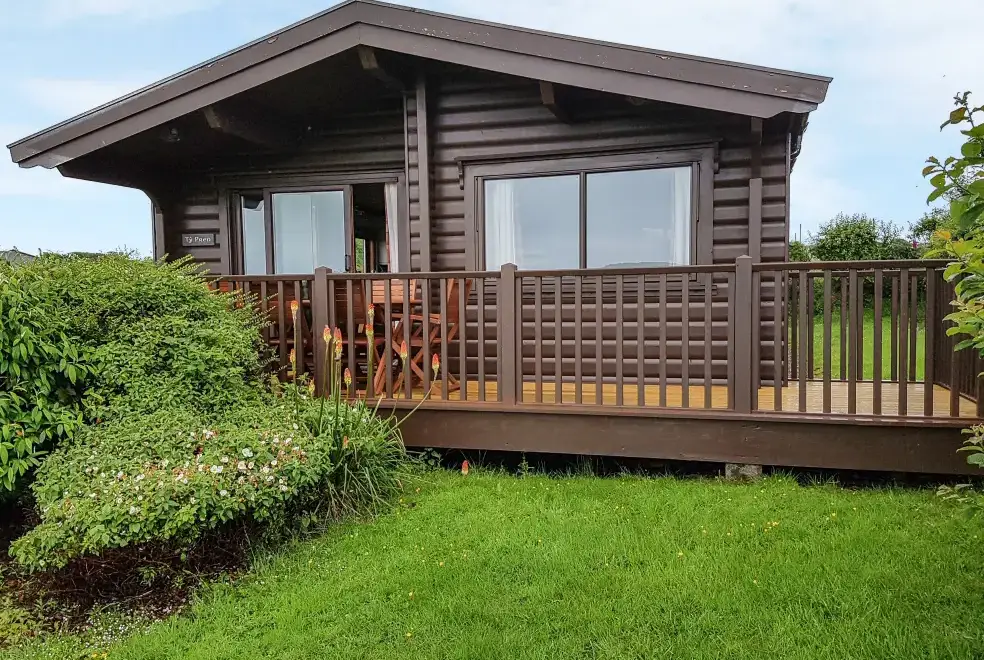 Decked area at Ty Pren Pet-Friendly Log Cabin, South Wales 