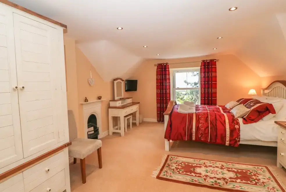 Bedroom at Tyddyn Goronwy Beach Cottage, Coastal Snowdonia