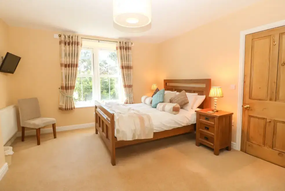 Bedroom at Tyddyn Goronwy Beach Cottage, Coastal Snowdonia