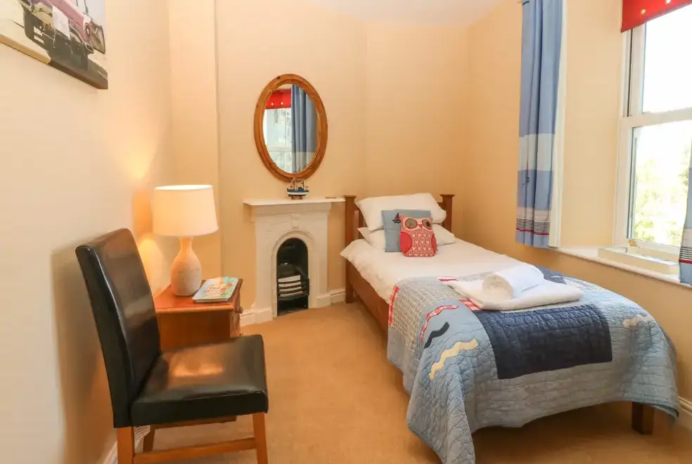 Bedroom at Tyddyn Goronwy Beach Cottage, Coastal Snowdonia