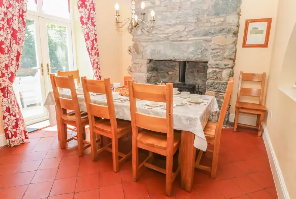 Dining room at Tyddyn Goronwy Beach Cottage, Coastal Snowdonia