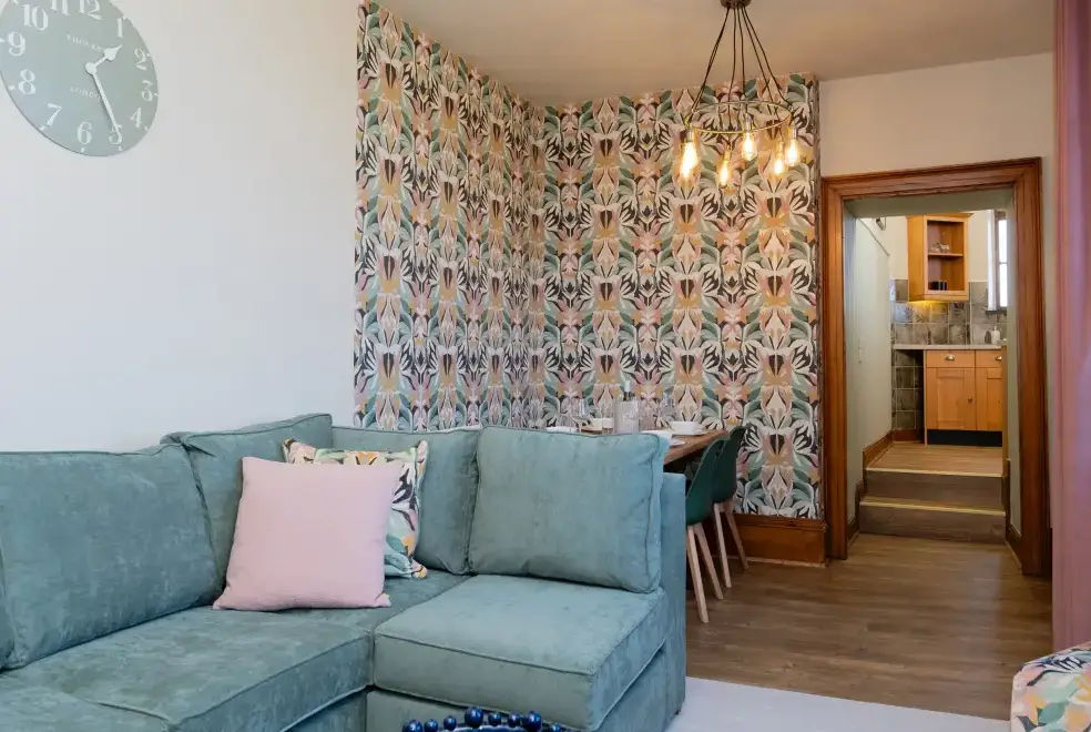 Open plan living area at Watermouth Castle, Harbour Apartment