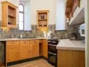 Kitchen/diner at Watermouth Castle, Harbour Apartment - thumbnail photo