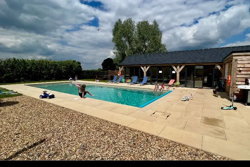 Outdoor swimming pool at Waterperry Cottage at Oxford Country Cottages