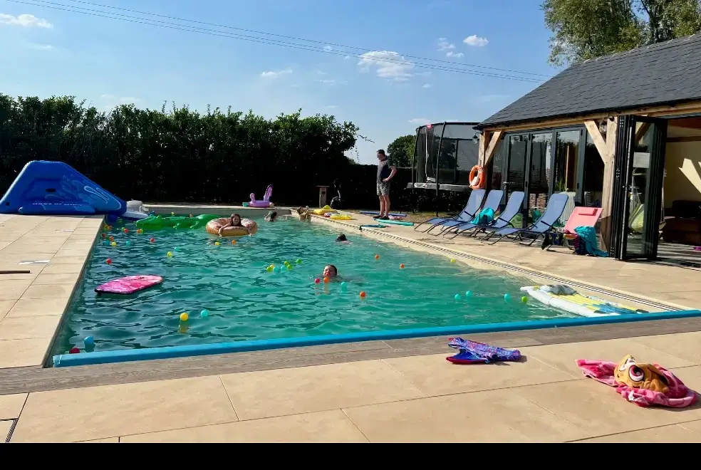 Outdoor swimming pool at Waterperry Cottage at Oxford Country Cottages