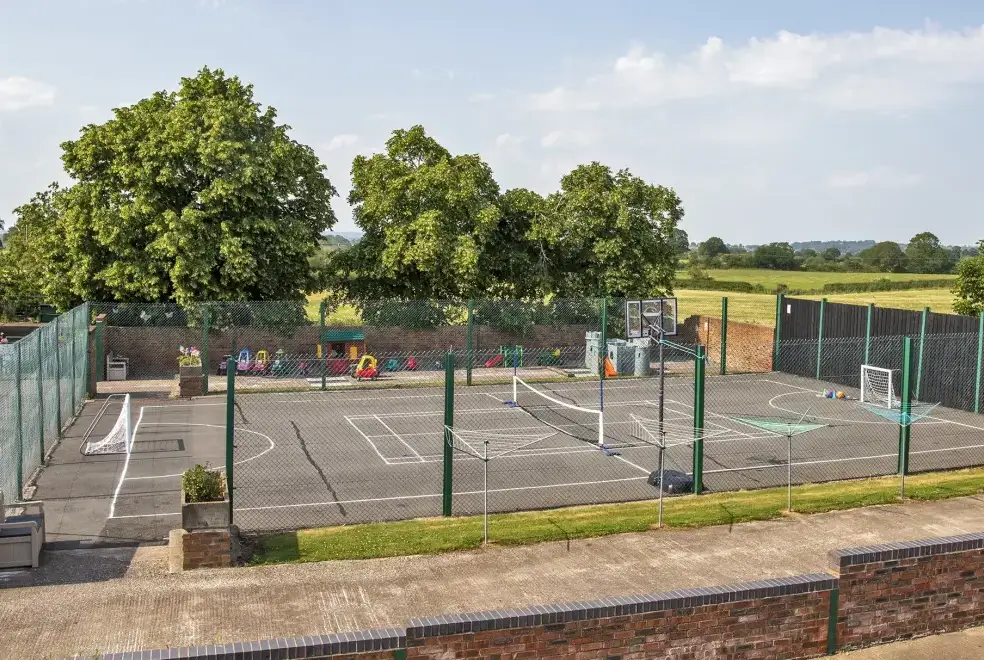 Outdoor games area at William's Hayloft with Swimming Pool, Sports Court & Toddler Play Area