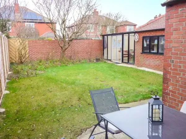 Enclosed garden at Wills Coastal Cottage