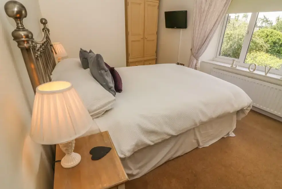 Bedroom at Woodbine Family Cottage, Cumbria and the Lake District 