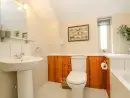 Family bathroom at Woodfield Coach House - thumbnail photo