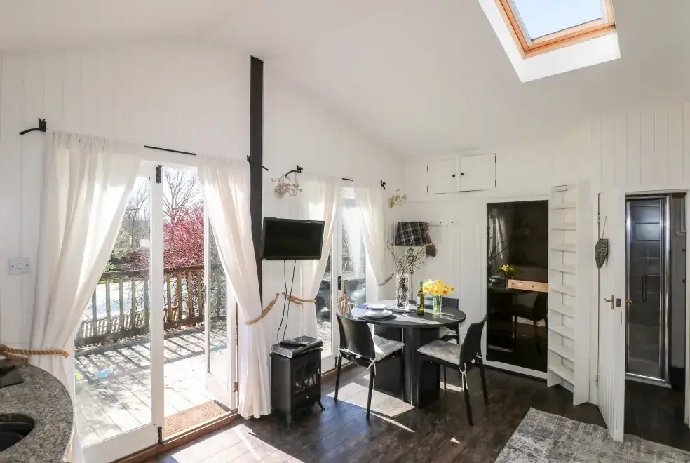 Open plan living area at Woodmancote Holiday Lodge