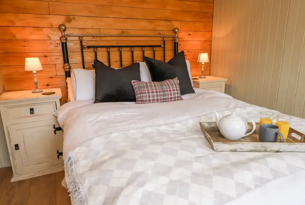 Bedroom at Woodmancote Holiday Lodge