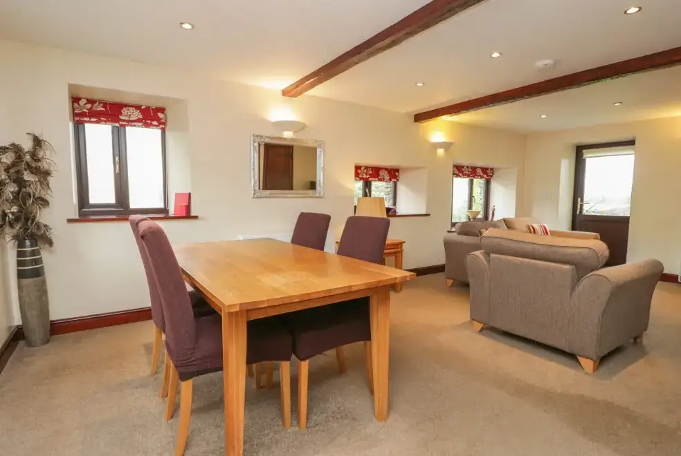 Open plan living area at Woodside Barn Family Cottage, Near the Lake District National Park