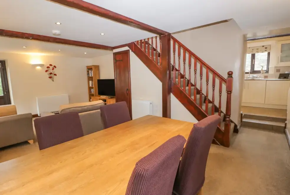 Open plan living area at Woodside Barn Family Cottage, Near the Lake District National Park