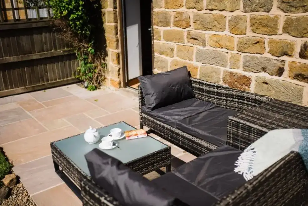 Patio area at Wren Cottage at Low Moor Holiday Cottages