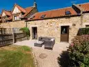 Patio area at Wren Cottage at Low Moor Holiday Cottages - thumbnail photo